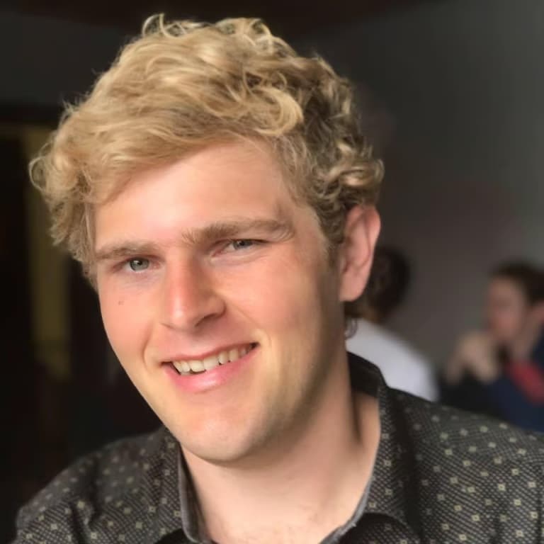 Josh Stroud smiling in a close-up profile photo